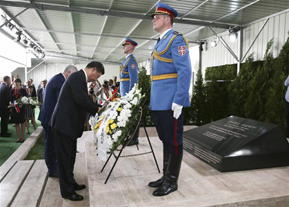Chinese President Xi Jinping and his wife Peng Liyuan pay homage to the Chinese martyrs killed in the NATO bombing of the former Chinese embassy in the Federal Republic of Yugoslavia in May 1999, after arriving in Belgrade for a state visit to Serbia, June 17, 2016. The three martyrs were journalists Shao Yunhuan of Xinhua News Agency, and Xu Xinghu and his wife Zhu Ying, of the Guangming Daily newspaper. (Photo: Xinhua/Lan Hongguang) Chinese President Xi Jinping and his wife Peng Liyuan pay homage to the Chinese martyrs killed in the NATO bombing of the former Chinese embassy in the Federal Republic of Yugoslavia in May 1999, after arriving in Belgrade for a state visit to Serbia, June 17, 2016. The three martyrs were journalists Shao Yunhuan of Xinhua News Agency, and Xu Xinghu and his wife Zhu Ying, of the Guangming Daily newspaper. (Photo: Xinhua/Lan Hongguang)