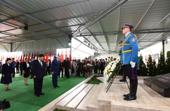 Chinese President Xi Jinping and his wife Peng Liyuan pay homage to the Chinese martyrs killed in the NATO bombing of the former Chinese embassy in the Federal Republic of Yugoslavia in May 1999, after arriving in Belgrade for a state visit to Serbia, June 17, 2016. (Xinhua/Rao Aimin) Chinese President Xi Jinping and his wife Peng Liyuan pay homage to the Chinese martyrs killed in the NATO bombing of the former Chinese embassy in the Federal Republic of Yugoslavia in May 1999, after arriving in Belgrade for a state visit to Serbia, June 17, 2016. (Xinhua/Rao Aimin)