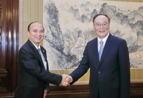 Wang Qishan (R), secretary of the Communist Party of China (CPC) Central Commission for Discipline Inspection (CCDI), meets with President of the Cambodian Anti-Corruption Unit (ACU) Om Yentieng in Beijing, capital of China, June 20, 2016. (Xinhua/Ju Peng) Wang Qishan (R), secretary of the Communist Party of China (CPC) Central Commission for Discipline Inspection (CCDI), meets with President of the Cambodian Anti-Corruption Unit (ACU) Om Yentieng in Beijing, capital of China, June 20, 2016. (Xinhua/Ju Peng)