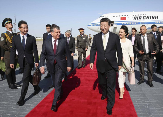Chinese President Xi Jinping (R,front) and his wife Peng Liyuan are greeted by Uzbek Prime Minister Shavkat Mirziyoev (L,front) and Governor of Bukhara Province Muhiddin Esanov upon their arrival at Bukhara International Airport, Uzbekistan, June 21, 2016. (Xinhua/Lan Hongguang) Chinese President Xi Jinping (R,front) and his wife Peng Liyuan are greeted by Uzbek Prime Minister Shavkat Mirziyoev (L,front) and Governor of Bukhara Province Muhiddin Esanov upon their arrival at Bukhara International Airport, Uzbekistan, June 21, 2016. (Xinhua/Lan Hongguang)