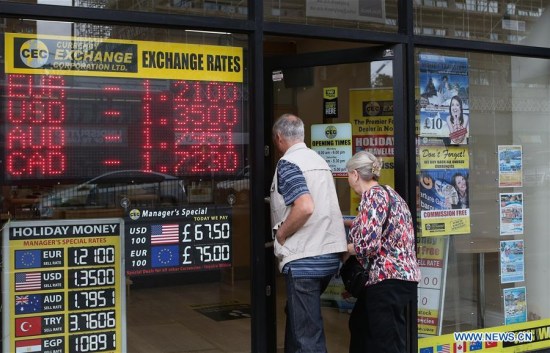 Customers enter a currency exchange shop in London, Britain, on June 24, 2016. (Xinhua/Han Yan) Customers enter a currency exchange shop in London, Britain, on June 24, 2016. (Xinhua/Han Yan)
