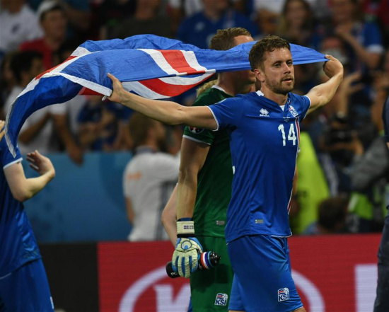 Kari Arnason of Iceland celebrates after winning the Euro 2016 round of 16 football match between England and Iceland in Nice, France, June 27, 2016. Iceland won 2-1. (Xinhua/Guo Yong) Kari Arnason of Iceland celebrates after winning the Euro 2016 round of 16 football match between England and Iceland in Nice, France, June 27, 2016. Iceland won 2-1. (Xinhua/Guo Yong)