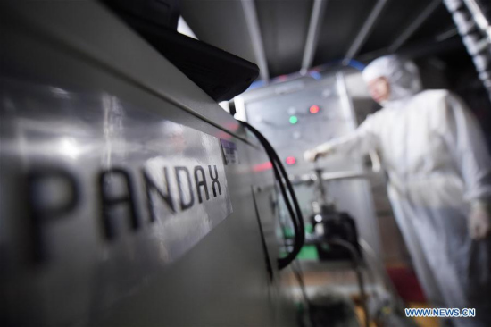 An experimenter of Dark Matter Experiment PandaX, which means Particle and Astrophysical Xenon Detector, checks facilities in the Jinping Underground Laboratory, located at 2,400 meters under the surface of Jinping Hydropower Station, in Sichuan Province, June 28, 2016. An experimenter of Dark Matter Experiment PandaX, which means Particle and Astrophysical Xenon Detector, checks facilities in the Jinping Underground Laboratory, located at 2,400 meters under the surface of Jinping Hydropower Station, in Sichuan Province, June 28, 2016.