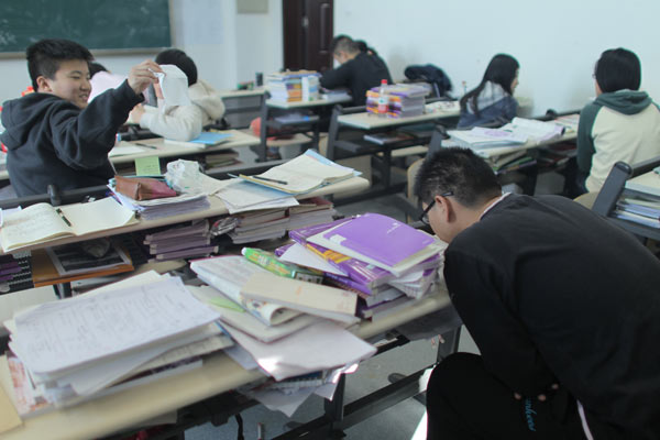 Students attend a cram school in Beijing's Changping district. (File Photo: China Daily / Wang Jing) Students attend a cram school in Beijing's Changping district. (File Photo: China Daily / Wang Jing)