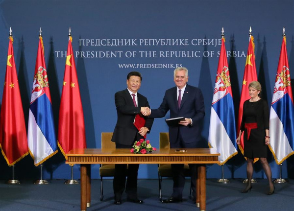 Chinese President Xi Jinping (L) and Serbian President Tomislav Nikolic attend a signing ceremony for a joint statement to lift bilateral relationship of China and Serbia to comprehensive strategic partnership after they held talks in Belgrade, Serbia, June 18, 2016. (Xinhua/Li Tao) Chinese President Xi Jinping (L) and Serbian President Tomislav Nikolic attend a signing ceremony for a joint statement to lift bilateral relationship of China and Serbia to comprehensive strategic partnership after they held talks in Belgrade, Serbia, June 18, 2016. (Xinhua/Li Tao)