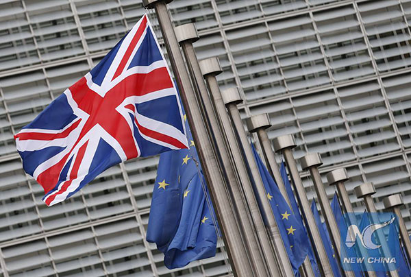 Photo taken on Jan. 29, 2016 shows the UK and EU flags outside the European Commission headquarters in Brussels, Belgium. (Xinhua/Ye Pingfan) Photo taken on Jan. 29, 2016 shows the UK and EU flags outside the European Commission headquarters in Brussels, Belgium. (Xinhua/Ye Pingfan)