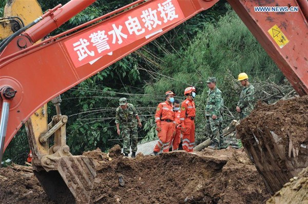 Rescuers work at the disaster site after a rain-triggered landslide hit Pianpo Village, Dafang County in the city of Bijie, southwest China's Guizhou Province, July 2, 2016. The landslide on Friday morning has caused 20 people dead, seven injured and three missing. 27 people have been rescued by now. (Xinhua/Yang Ying) Rescuers work at the disaster site after a rain-triggered landslide hit Pianpo Village, Dafang County in the city of Bijie, southwest China's Guizhou Province, July 2, 2016. The landslide on Friday morning has caused 20 people dead, seven injured and three missing. 27 people have been rescued by now. (Xinhua/Yang Ying)