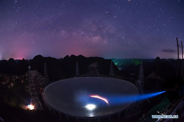 Photo taken on June 27, 2016 shows the Five-hundred-meter Aperture Spherical Telescope, or FAST, at night in Pingtang County, southwest China's Guizhou Province. Construction of the world's largest telescope FAST started in March 2011. The telescope will be used to detect and collect signals and data from the universe. (Xinhua/Liu Xu) Photo taken on June 27, 2016 shows the Five-hundred-meter Aperture Spherical Telescope, or FAST, at night in Pingtang County, southwest China's Guizhou Province. Construction of the world's largest telescope FAST started in March 2011. The telescope will be used to detect and collect signals and data from the universe. (Xinhua/Liu Xu)
