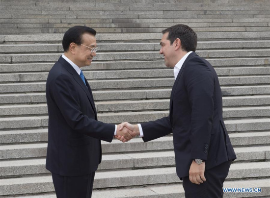 Chinese Premier Li Keqiang (L) shakes hands with visiting Greek Prime Minister Alexis Tsipras during a welcoming ceremony for Tsipras before their talks in Beijing, capital of China, July 4, 2016. (Xinhua/Wang Ye) Chinese Premier Li Keqiang (L) shakes hands with visiting Greek Prime Minister Alexis Tsipras during a welcoming ceremony for Tsipras before their talks in Beijing, capital of China, July 4, 2016. (Xinhua/Wang Ye)