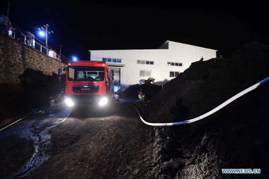 Rescuers work at the site of a coalmine in which a fire broke out in Benxi City, northeast China's Liaoning Province, July 4, 2016. (Xinhua/Yang Qing) Rescuers work at the site of a coalmine in which a fire broke out in Benxi City, northeast China's Liaoning Province, July 4, 2016. (Xinhua/Yang Qing)