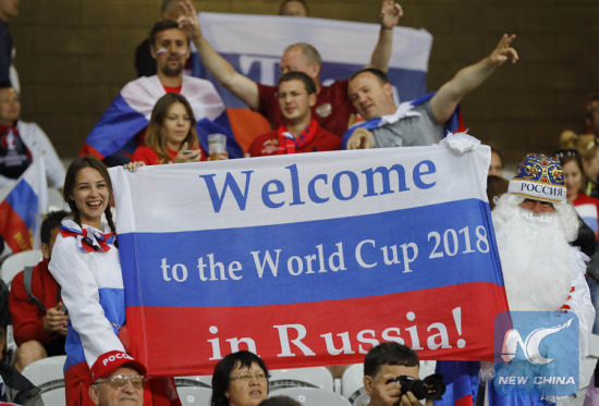 Russian supporters hold a flag reading Welcome to the World Cup 2018 in Russia, as they wait for the start of the Euro 2016 Group B soccer match between Russia and Slovakia at the Pierre Mauroy stadium in Villeneuve d'Ascq, near Lille, France, Wednesday, June 15, 2016. (AP Photo/Frank Augstein) Russian supporters hold a flag reading Welcome to the World Cup 2018 in Russia, as they wait for the start of the Euro 2016 Group B soccer match between Russia and Slovakia at the Pierre Mauroy stadium in Villeneuve d'Ascq, near Lille, France, Wednesday, June 15, 2016. (AP Photo/Frank Augstein)