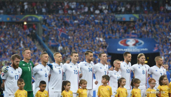Players of Iceland sing national anthem before the Euro 2016 quarterfinal match between France and Iceland in Paris, France, July 3, 2016. (Xinhua/Tao Xiyi) Players of Iceland sing national anthem before the Euro 2016 quarterfinal match between France and Iceland in Paris, France, July 3, 2016. (Xinhua/Tao Xiyi)