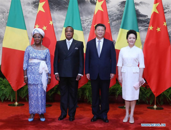 Chinese President Xi Jinping (2nd R), his wife Peng Liyuan (1st R)pose for a group photo with Republic of Congo President Denis Sassou Nguesso (2nd L) and his wife Antoinette Sassou Nguesso(1st L) outside the Great Hall of the People in Beijing, capital of China, July 5, 2016. (Xinhua/Yao Dawei) Chinese President Xi Jinping (2nd R), his wife Peng Liyuan (1st R)pose for a group photo with Republic of Congo President Denis Sassou Nguesso (2nd L) and his wife Antoinette Sassou Nguesso(1st L) outside the Great Hall of the People in Beijing, capital of China, July 5, 2016. (Xinhua/Yao Dawei)