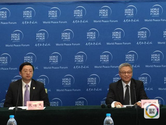 Secretary-General of World Peace Forum Yan Xuetong (R) is on a press briefing on July 6, 2016. (Xinhua/Du Baiyu) Secretary-General of World Peace Forum Yan Xuetong (R) is on a press briefing on July 6, 2016. (Xinhua/Du Baiyu)