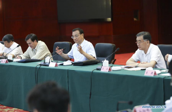 Chinese Premier Li Keqiang (2nd R) presides over a meeting on flood control and disaster relief in Yueyang, central China's Hunan Province, July 5, 2016. (Xinhua/Pang Xinglei) Chinese Premier Li Keqiang (2nd R) presides over a meeting on flood control and disaster relief in Yueyang, central China's Hunan Province, July 5, 2016. (Xinhua/Pang Xinglei)