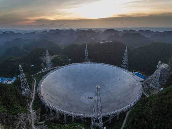 The 500 meter aperture spherical telescope in Pingtang county, Guizhou, to be completed in September, is expected to be the world's largest, overtaking Puerto Rico's Arecibo Observatory, which is 300 meters in diameter.(Photo/Xinhua) The 500 meter aperture spherical telescope in Pingtang county, Guizhou, to be completed in September, is expected to be the world's largest, overtaking Puerto Rico's Arecibo Observatory, which is 300 meters in diameter.(Photo/Xinhua)
