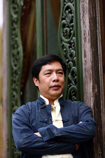 Director and producer Mei Shuaiyuan is known for shijing yanchu, or shows that use real scenery in open-air performances with hundreds of performers to display local culture and traditions.(Photo provided to China Daily) Director and producer Mei Shuaiyuan is known for shijing yanchu, or shows that use real scenery in open-air performances with hundreds of performers to display local culture and traditions.(Photo provided to China Daily)