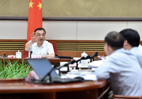 Chinese Premier Li Keqiang (L) presides over a symposium studying the current economic situation with experts and entrepreneurs, in Beijing, capital of China, July 12, 2016. (Xinhua/Li Tao) Chinese Premier Li Keqiang (L) presides over a symposium studying the current economic situation with experts and entrepreneurs, in Beijing, capital of China, July 12, 2016. (Xinhua/Li Tao)