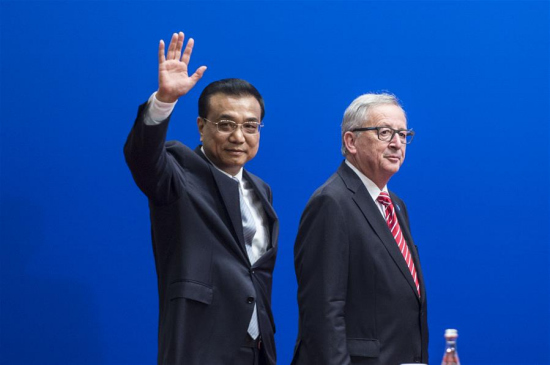 Chinese Premier Li Keqiang (L) and European Commission President Jean-Claude Juncker attend the 11th EU-China Business Summit in Beijing, capital of China, July 13, 2016. (Xinhua/Xie Huanchi) Chinese Premier Li Keqiang (L) and European Commission President Jean-Claude Juncker attend the 11th EU-China Business Summit in Beijing, capital of China, July 13, 2016. (Xinhua/Xie Huanchi)