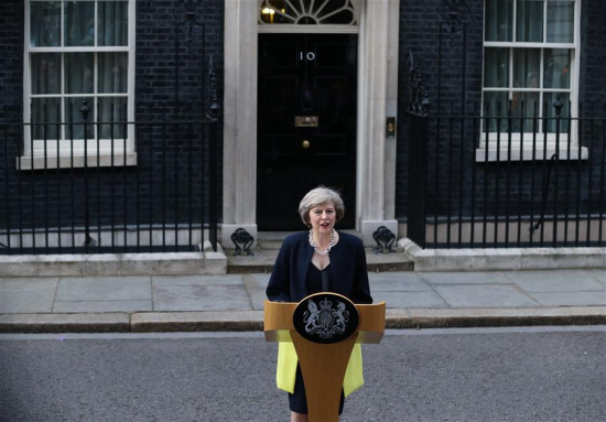 Britain's new Prime Minister Theresa May delivers a speech after arriving at 10 Downing Street in London, Britain on July 13, 2016. Britain's new Prime Minister Theresa May arrived at Downing Street on Wednesday after gaining consent from Queen Elizabeth II. (Xinhua/Han Yan) Britain's new Prime Minister Theresa May delivers a speech after arriving at 10 Downing Street in London, Britain on July 13, 2016. Britain's new Prime Minister Theresa May arrived at Downing Street on Wednesday after gaining consent from Queen Elizabeth II. (Xinhua/Han Yan)
