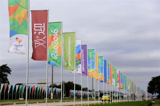 Photo taken on July 7, 2016 shows the flags printed with different languages of Welcome on the way to Tom Jobim International Airport in Rio de Janeiro, Brazil. The 2016 Rio Olympic Games will be held from August 5 to 21. (Photo/Xinhua) Photo taken on July 7, 2016 shows the flags printed with different languages of Welcome on the way to Tom Jobim International Airport in Rio de Janeiro, Brazil. The 2016 Rio Olympic Games will be held from August 5 to 21. (Photo/Xinhua)