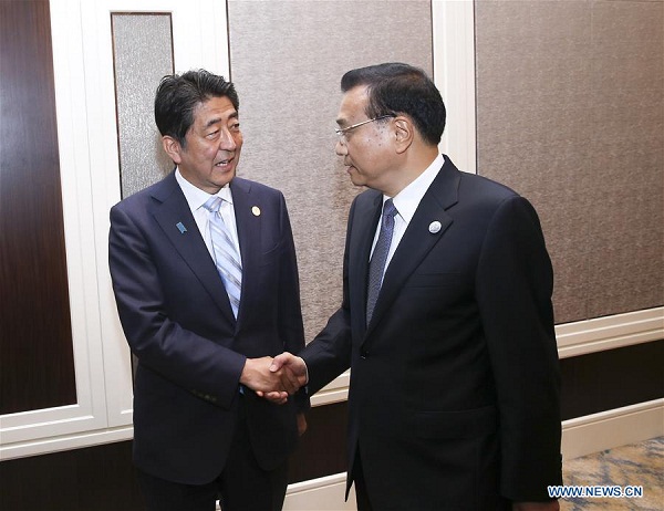 Chinese Premier Li Keqiang (R) meets with Japanese Prime Minister Shinzo Abe in Ulan Bator, Mongolia, July 15, 2016. (Photo:Xinhua/Pang Xinglei) Chinese Premier Li Keqiang (R) meets with Japanese Prime Minister Shinzo Abe in Ulan Bator, Mongolia, July 15, 2016. (Photo:Xinhua/Pang Xinglei)