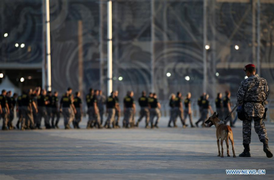A National Force officer walks with a patrol dog in front of the Olympic Aquatics Stadium after the inauguration ceremony of the integrated security operation for Rio 2016 Games in Rio de Janeiro, Brazil, on July 5, 2016. (Photo/Xinhua) A National Force officer walks with a patrol dog in front of the Olympic Aquatics Stadium after the inauguration ceremony of the integrated security operation for Rio 2016 Games in Rio de Janeiro, Brazil, on July 5, 2016. (Photo/Xinhua)