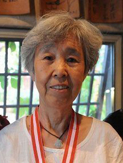 Tian Ying, winner of the 11th Austrian Mahjong Open. (Photo/China Daily) Tian Ying, winner of the 11th Austrian Mahjong Open. (Photo/China Daily)