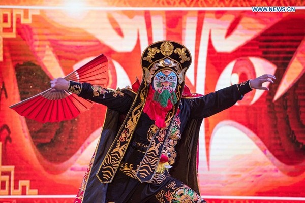 A Chinese artist performs mask-changing dance during the China Day of the 1st Afro-Chinese Arts and Folklore Festival, in Cairo, Egypt, July 22, 2016. Performances on China Day, the second day of the 1st Afro-Chinese Arts and Folklore Festival, have attracted many Egyptian, Chinese and African audiences at Egypt's Opera House in downtown Cairo on Friday. (Xinhua/Meng Tao) A Chinese artist performs mask-changing dance during the China Day of the 1st Afro-Chinese Arts and Folklore Festival, in Cairo, Egypt, July 22, 2016. Performances on China Day, the second day of the 1st Afro-Chinese Arts and Folklore Festival, have attracted many Egyptian, Chinese and African audiences at Egypt's Opera House in downtown Cairo on Friday. (Xinhua/Meng Tao)