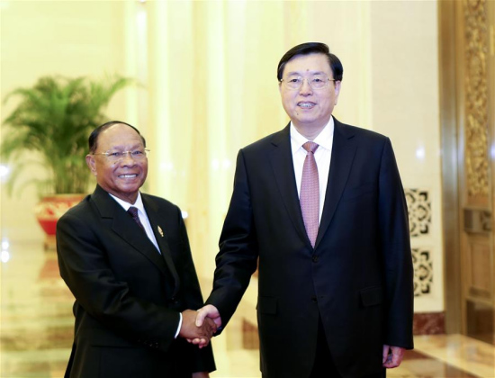 Zhang Dejiang (R), chairman of the Standing Committee of China's National People's Congress, shakes hands with Cambodia's National Assembly President Samdech Heng Samrin in Beijing, capital of China, July 25, 2016. (Xinhua/Ding Lin) Zhang Dejiang (R), chairman of the Standing Committee of China's National People's Congress, shakes hands with Cambodia's National Assembly President Samdech Heng Samrin in Beijing, capital of China, July 25, 2016. (Xinhua/Ding Lin)