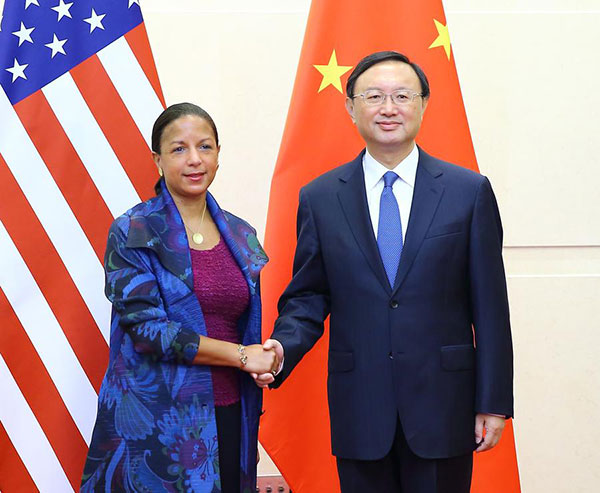 Chinese State Councilor Yang Jiechi (R) shakes hands with US National Security Advisor Susan Rice in Beijing, July 25, 2016. (Photo/Xinhua) Chinese State Councilor Yang Jiechi (R) shakes hands with US National Security Advisor Susan Rice in Beijing, July 25, 2016. (Photo/Xinhua)