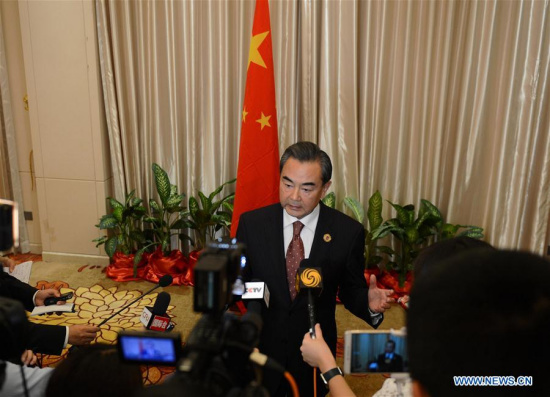 Chinese Foreign Minister Wang Yi(C) speaks to the press after the meetings in Vientiane, capital of Laos, on July 26, 2016. (Xinhua/Liu Ailun) Chinese Foreign Minister Wang Yi(C) speaks to the press after the meetings in Vientiane, capital of Laos, on July 26, 2016. (Xinhua/Liu Ailun)