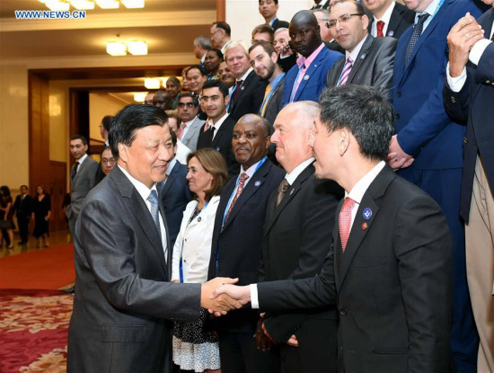 Liu Yunshan (L front), a member of the Standing Committee of the Political Bureau of the Communist Party of China (CPC) Central Committee, meets with foreign representatives at the 2016 Media Cooperation Forum on the Belt and Road in Beijing, capital of China, July 27, 2016. (Xinhua/Rao Aimin) Liu Yunshan (L front), a member of the Standing Committee of the Political Bureau of the Communist Party of China (CPC) Central Committee, meets with foreign representatives at the 2016 Media Cooperation Forum on the Belt and Road in Beijing, capital of China, July 27, 2016. (Xinhua/Rao Aimin)