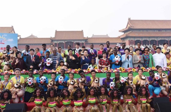 Chinese President Xi Jinping's wife Peng Liyuan, who is also the World Health Organization goodwill ambassador for tuberculosis and HIV/AIDS, attends the opening ceremony for Love in the Sunshine-- the 2016 China-Africa Children Summer Camp, at the Palace Museum in Beijing, capital of China, July 29, 2016. (Photo: Xinhua/Rao Aimin) Chinese President Xi Jinping's wife Peng Liyuan, who is also the World Health Organization goodwill ambassador for tuberculosis and HIV/AIDS, attends the opening ceremony for Love in the Sunshine-- the 2016 China-Africa Children Summer Camp, at the Palace Museum in Beijing, capital of China, July 29, 2016. (Photo: Xinhua/Rao Aimin)