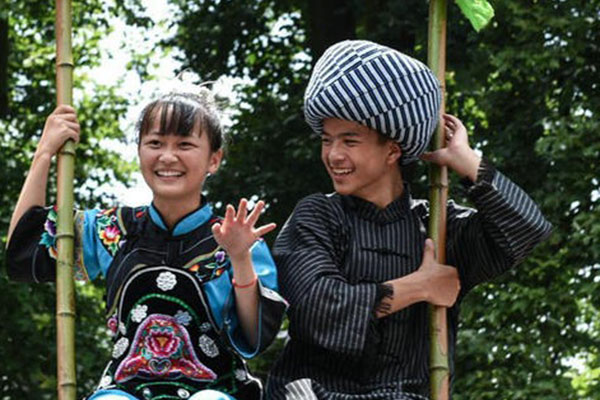 Villagers of Miao ethic group celebrate the traditional festival on the sixth day of sixth month of Chinese lunar calendar in Jiulong village of Songtao Miao Ethic autonomous county, Southwest China's Guizhou province, July 9, 2016. (Photo/Xinhua) Villagers of Miao ethic group celebrate the traditional festival on the sixth day of sixth month of Chinese lunar calendar in Jiulong village of Songtao Miao Ethic autonomous county, Southwest China's Guizhou province, July 9, 2016. (Photo/Xinhua)