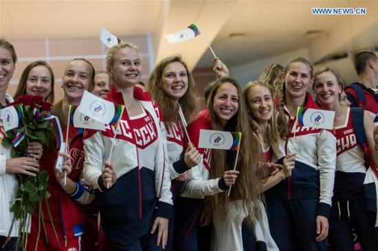 Russian athletes bid farewell to people at the Sheremetyevo airport in Moscow, Russia, July 28, 2016. (Xinhua/Evgeny Sinitsyn) Russian athletes bid farewell to people at the Sheremetyevo airport in Moscow, Russia, July 28, 2016. (Xinhua/Evgeny Sinitsyn)