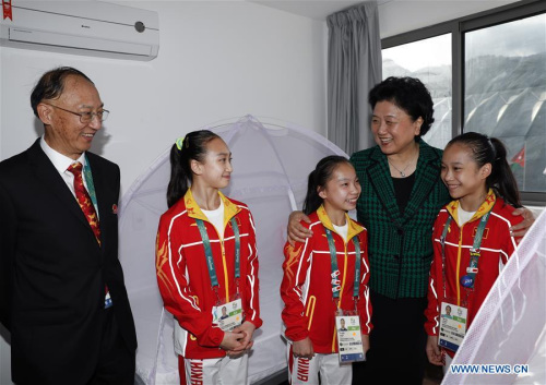 Chinese vice premier Liu Yandong(2nd R), Chinese president Xi Jinping's special envoy, hugs members of Chinese gymnastics team during her visit to Chinese Olympic delegation in Rio de Janeiro, Brazil on Aug. 4, 2016. Liu Yandong visited Chinese Olympic delegation here on Thursday. (Xinhua/Han Yan) Chinese vice premier Liu Yandong(2nd R), Chinese president Xi Jinping's special envoy, hugs members of Chinese gymnastics team during her visit to Chinese Olympic delegation in Rio de Janeiro, Brazil on Aug. 4, 2016. Liu Yandong visited Chinese Olympic delegation here on Thursday. (Xinhua/Han Yan)