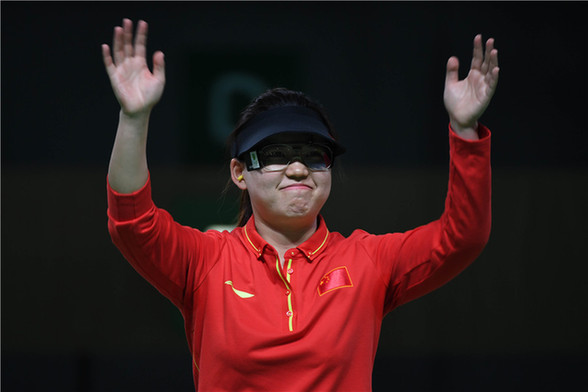 The 25-year-old Zhang Mengxue won China's first gold at the Rio Olympics by claiming the women's 10m air pistol title here on Aug. 7, 2016. (Photo/Xinhua) The 25-year-old Zhang Mengxue won China's first gold at the Rio Olympics by claiming the women's 10m air pistol title here on Aug. 7, 2016. (Photo/Xinhua)