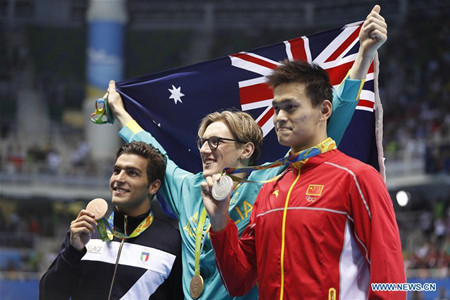 Gold medalist Australia's Mack Horton (C), silver medalist China's Sun Yang (R) and bronze medalist Italy's Gabriele Detti pose for photos after the awarding ceremony of men's 400m freestyle swimming final at the 2016 Rio Olympic Games in Rio de Janeiro, Brazil, on Aug. 6, 2016.(Xinhua/Fei Maohua) Gold medalist Australia's Mack Horton (C), silver medalist China's Sun Yang (R) and bronze medalist Italy's Gabriele Detti pose for photos after the awarding ceremony of men's 400m freestyle swimming final at the 2016 Rio Olympic Games in Rio de Janeiro, Brazil, on Aug. 6, 2016.(Xinhua/Fei Maohua)