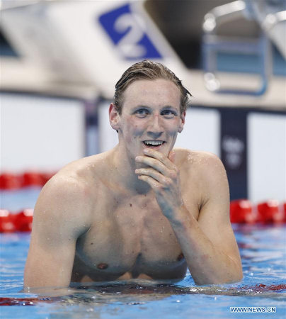 Australia's Mack Horton celebrates after men's 400m freestyle final of swimming at the 2016 Rio Olympic Games in Rio de Janeiro, Brazil, on Aug. 6, 2016. Mack Horton won the gold medal with 3 minutes 41.55 seconds.(Xinhua/Fei Maohua) Australia's Mack Horton celebrates after men's 400m freestyle final of swimming at the 2016 Rio Olympic Games in Rio de Janeiro, Brazil, on Aug. 6, 2016. Mack Horton won the gold medal with 3 minutes 41.55 seconds.(Xinhua/Fei Maohua)