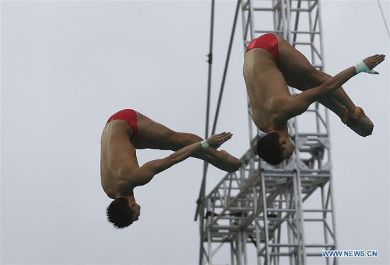 Lin Yue (L) and Chen Aisen of China compete during the men's synchronised 10m platform final of diving at the 2016 Rio Olympic Games in Rio de Janeiro, Brazil, on Aug. 8, 2016. Lin Yue and Chen Aisen of China won gold medal with the score of 496.98. (Xinhua/Cao Can) Lin Yue (L) and Chen Aisen of China compete during the men's synchronised 10m platform final of diving at the 2016 Rio Olympic Games in Rio de Janeiro, Brazil, on Aug. 8, 2016. Lin Yue and Chen Aisen of China won gold medal with the score of 496.98. (Xinhua/Cao Can)