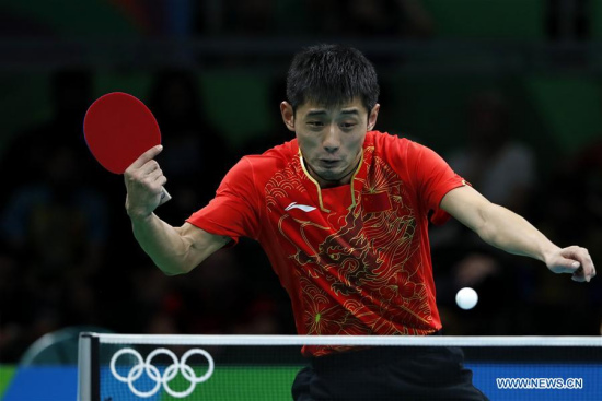Zhang Jike of China competes during the men's single round 3 of table tennis against Chen Chien-An of Chinese Taipei at the 2016 Rio Olympic Games in Rio de Janeiro, Brazil, on Aug. 8, 2016. Zhang Jike won with 4:0. (Xinhua/Shen Bohan) Zhang Jike of China competes during the men's single round 3 of table tennis against Chen Chien-An of Chinese Taipei at the 2016 Rio Olympic Games in Rio de Janeiro, Brazil, on Aug. 8, 2016. Zhang Jike won with 4:0. (Xinhua/Shen Bohan)