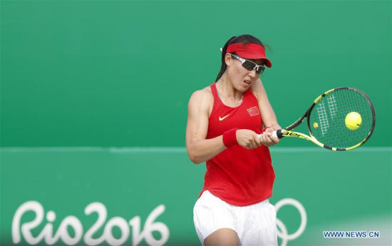 Zheng Saisai of China competes during the women's singles second round of tennis against Daria Kasatkina of Russia at the 2016 Rio Olympic Games in Rio de Janeiro, Brazil, on Aug. 8, 2016. Daria Kasatkina won Zheng Saisai with 2:0. (Xinhua/Han Yan) Zheng Saisai of China competes during the women's singles second round of tennis against Daria Kasatkina of Russia at the 2016 Rio Olympic Games in Rio de Janeiro, Brazil, on Aug. 8, 2016. Daria Kasatkina won Zheng Saisai with 2:0. (Xinhua/Han Yan)
