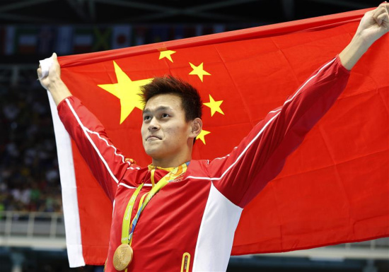 Sun Yang of China celebrates during the awarding ceremony of men's 200m freestyle swimming final at the 2016 Rio Olympic Games in Rio de Janeiro, Brazil, on Aug. 8, 2016. Sun Yang won the gold medal with 1 minute 44.65 seconds.(Xinhua/Ding Xu) Sun Yang of China celebrates during the awarding ceremony of men's 200m freestyle swimming final at the 2016 Rio Olympic Games in Rio de Janeiro, Brazil, on Aug. 8, 2016. Sun Yang won the gold medal with 1 minute 44.65 seconds.(Xinhua/Ding Xu)