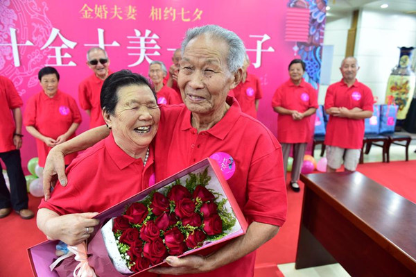 An elderly couple celebrate their golden marriage anniversary before the Qixi Festival, in Heifei, Anhui province, August 2, 2016. (Photo/Xinhua) An elderly couple celebrate their golden marriage anniversary before the Qixi Festival, in Heifei, Anhui province, August 2, 2016. (Photo/Xinhua)