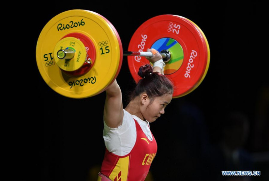 Deng Wei of China competes during the women's 63KG weightlifting group A final at the 2016 Rio Olympic Games in Rio de Janeiro, Brazil, on Aug. 9, 2016. Deng Wei won gold medal with clean and jerk, total world records. (Xinhua/Cheng Min) Deng Wei of China competes during the women's 63KG weightlifting group A final at the 2016 Rio Olympic Games in Rio de Janeiro, Brazil, on Aug. 9, 2016. Deng Wei won gold medal with clean and jerk, total world records. (Xinhua/Cheng Min)