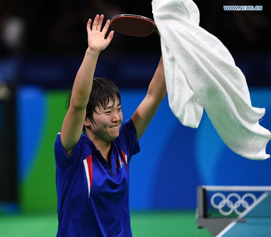 Kim Song-I of the Democratic People's Republic of Korea (DPRK) celebrates for wining over Japan's Ai Fukuhara during the women's singles bronze madel match of table tennis at the 2016 Rio Olympic Games in Rio de Janeiro, Brazil, on Aug. 10, 2016. Kim Song I won the match 4-1. (Xinhua/Lin Yiguang) Kim Song-I of the Democratic People's Republic of Korea (DPRK) celebrates for wining over Japan's Ai Fukuhara during the women's singles bronze madel match of table tennis at the 2016 Rio Olympic Games in Rio de Janeiro, Brazil, on Aug. 10, 2016. Kim Song I won the match 4-1. (Xinhua/Lin Yiguang)
