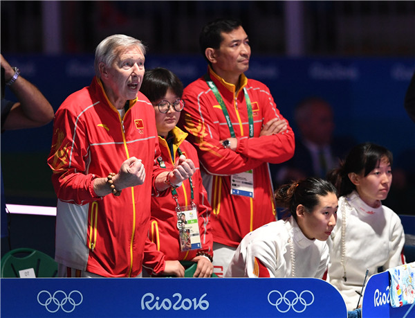 Daniel Levavasseur, head coach of Chinese national epee team, cheer up for his player during the women's epee team final at Carioca Arena 3, Rio de Janeiro, Brazil on August 11, 2016. (Photo by Wei Xiaohao/chinadaily.com.cn) Daniel Levavasseur, head coach of Chinese national epee team, cheer up for his player during the women's epee team final at Carioca Arena 3, Rio de Janeiro, Brazil on August 11, 2016. (Photo by Wei Xiaohao/chinadaily.com.cn)