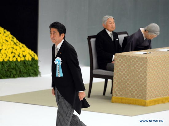 Japanese Prime Minister Shinzo Abe (front) attends the ceremony marking the 71st anniversary of Japan's unconditional surrender in World War II in Tokyo, Japan, Aug. 15, 2016. (Xinhua/Ma Ping) Japanese Prime Minister Shinzo Abe (front) attends the ceremony marking the 71st anniversary of Japan's unconditional surrender in World War II in Tokyo, Japan, Aug. 15, 2016. (Xinhua/Ma Ping)