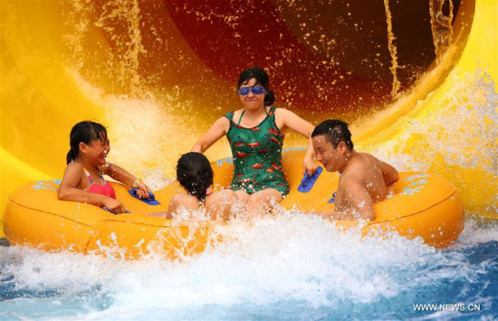 Local residents have a good time in an aqua park amid hot weather in Luzhou, southwest China's Sichuan Province, Aug. 13, 2016. (Xinhua/Yang Tao) Local residents have a good time in an aqua park amid hot weather in Luzhou, southwest China's Sichuan Province, Aug. 13, 2016. (Xinhua/Yang Tao)